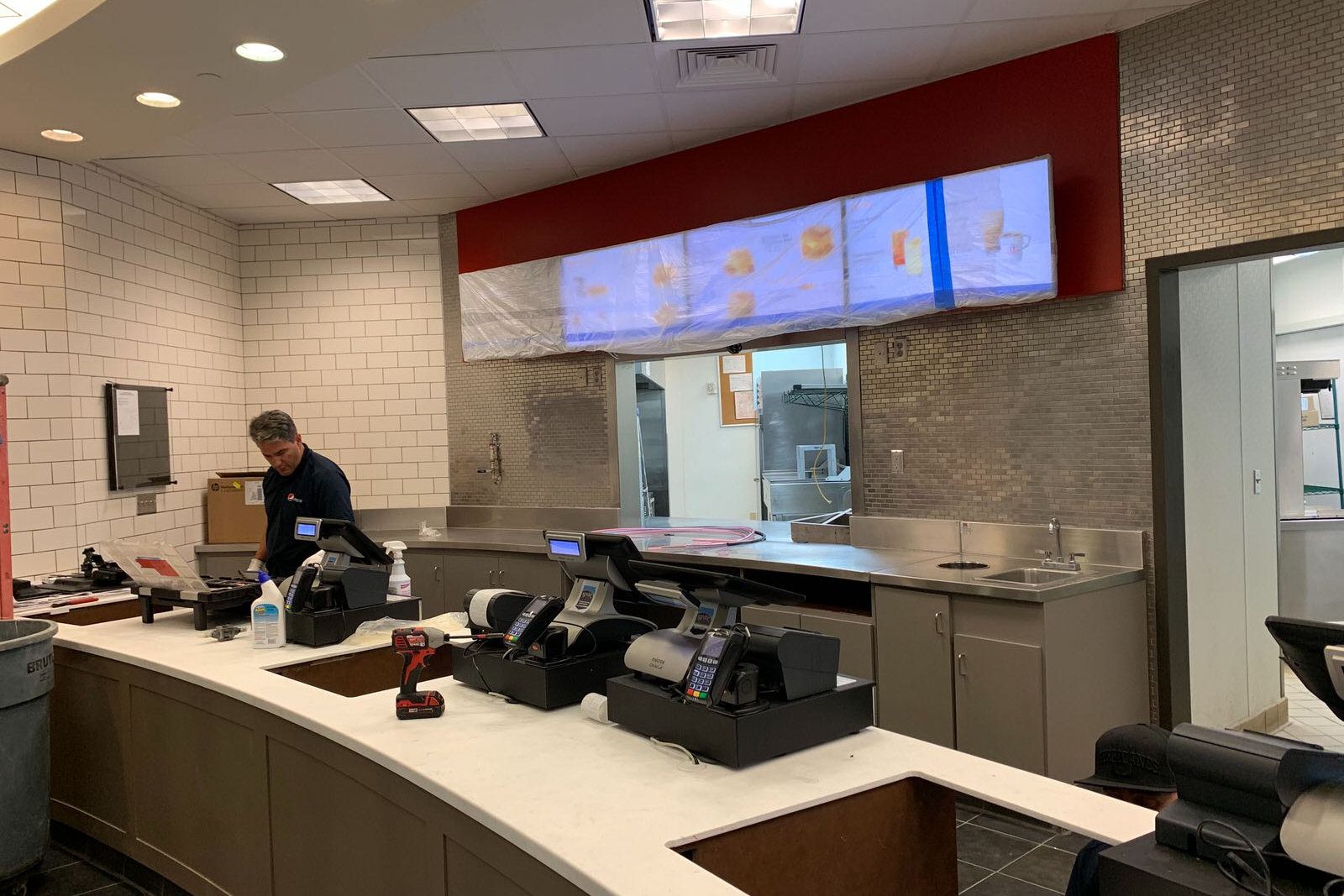 Finished quick-service restaurant counter with menu boards